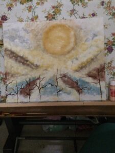11 - Sun with clouds and barren trees